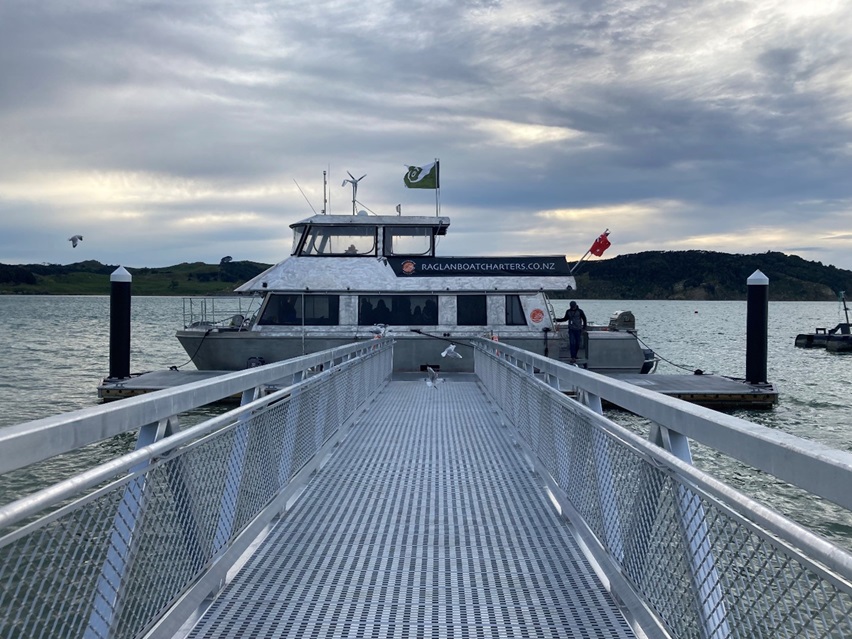 The Wahine Moe moored at the end of the pontoon